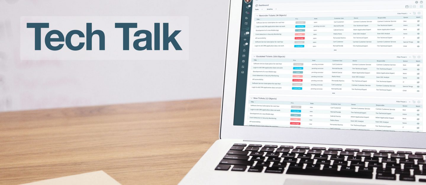 Laptop shows OTRS screen on a desk with headline tech talk